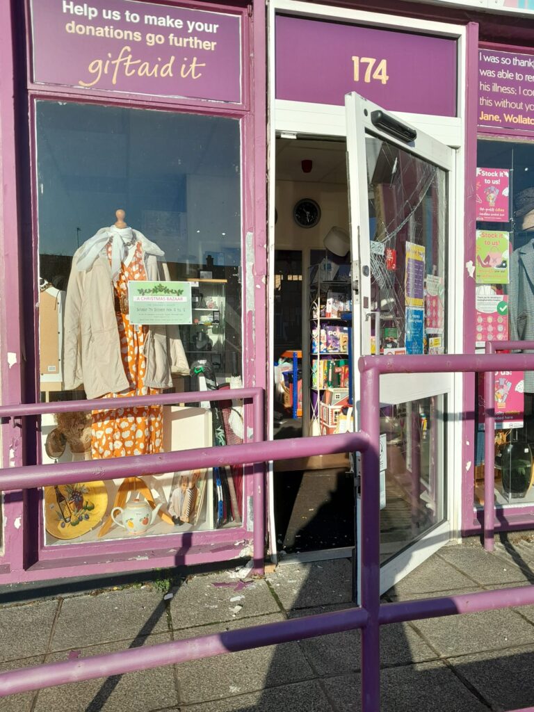 Door of shop ripped open and shattered